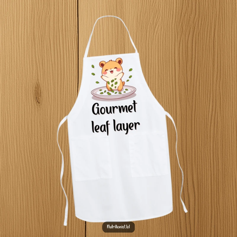 Funny apron depicting a small, energetic creature joyfully sprinkling green leaves onto a plate, designed for kitchen protection with a humorous culinary theme.